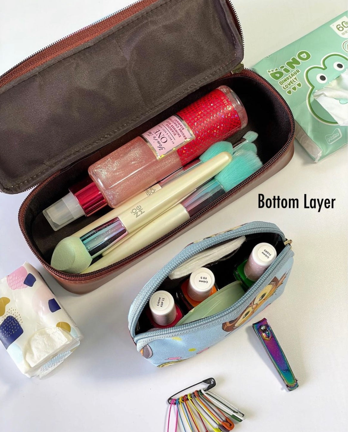 Double layer cosmetic bag with a small pouch