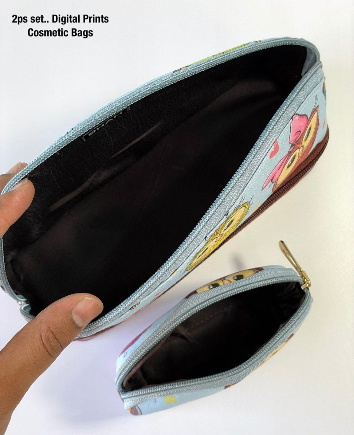 Double layer cosmetic bag with a small pouch